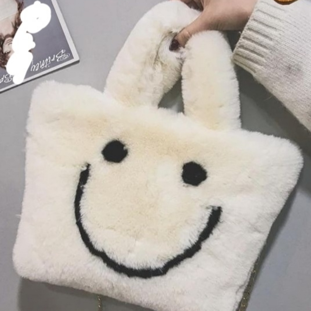 Smiley face fuzzy purse